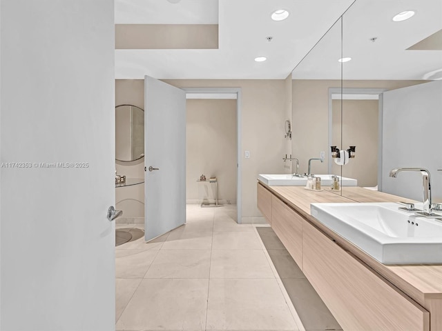 bathroom featuring vanity and tile patterned floors