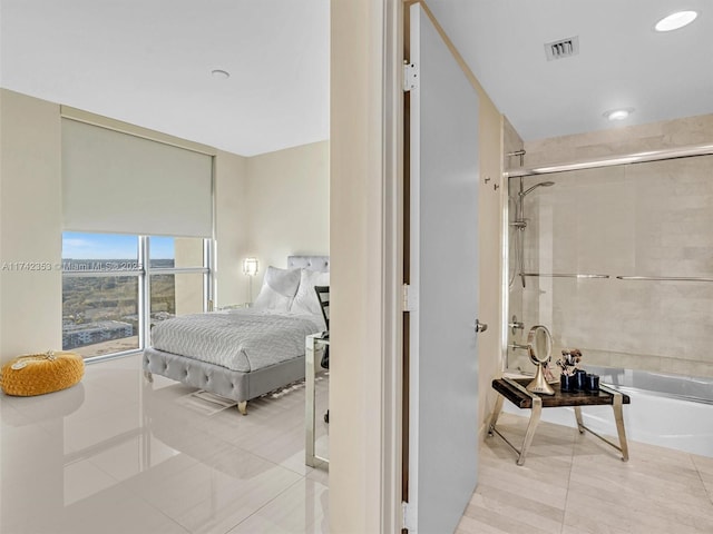 bedroom with light tile patterned flooring