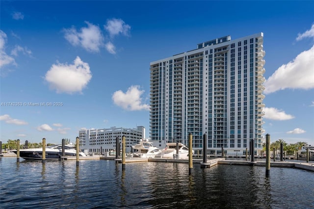 property view of water with a dock