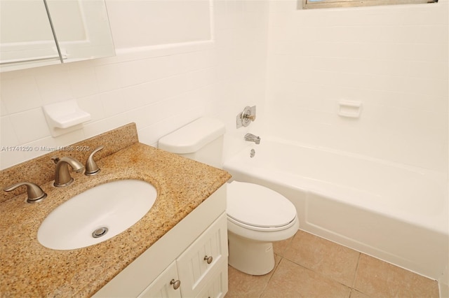 full bathroom featuring tile walls, vanity, toilet, tub / shower combination, and tile patterned floors