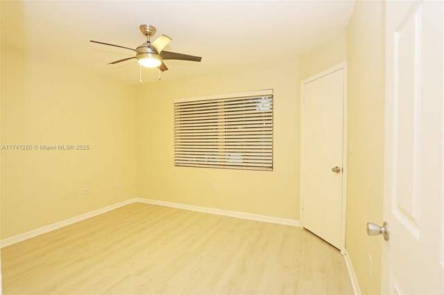 spare room with ceiling fan and light hardwood / wood-style flooring