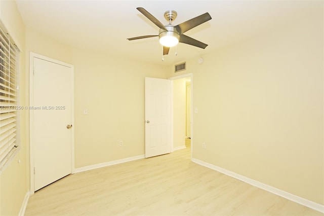 unfurnished bedroom featuring light hardwood / wood-style floors and ceiling fan