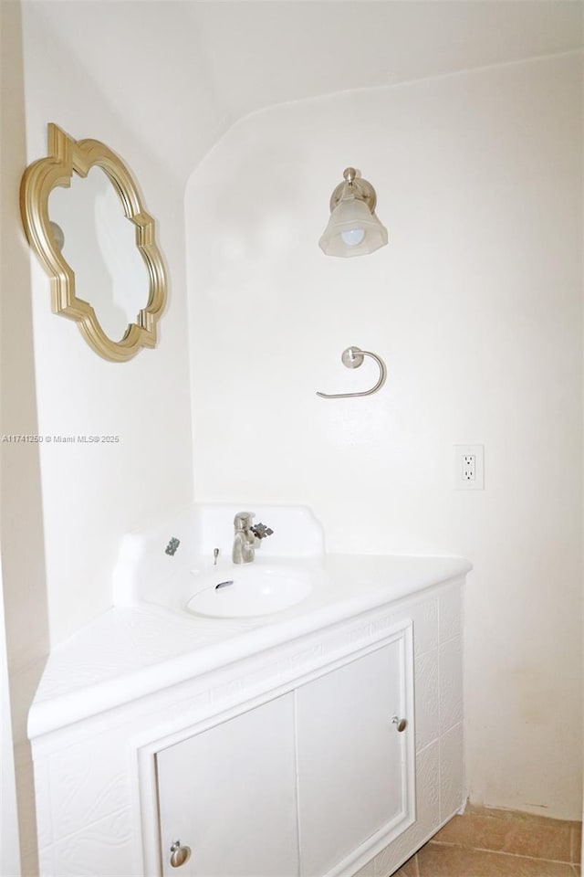 bathroom featuring tile patterned floors and vanity