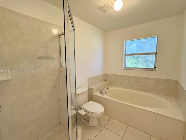 full bath featuring a bath, tile patterned flooring, visible vents, toilet, and a stall shower