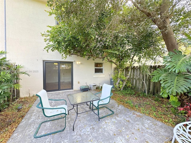 view of patio / terrace with fence
