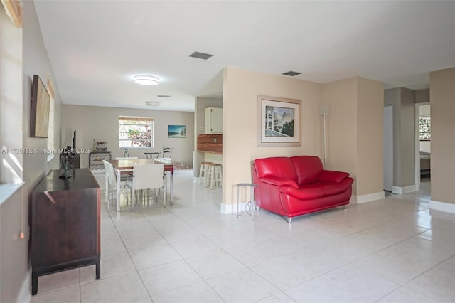 living room featuring light tile patterned floors