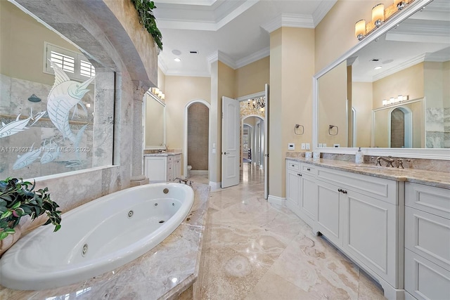 bathroom featuring vanity, ornamental molding, and a relaxing tiled tub