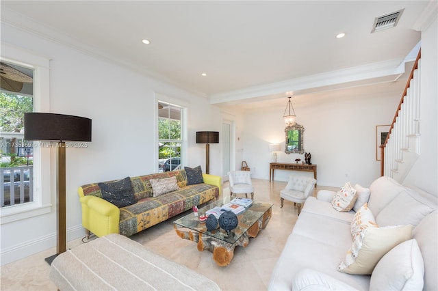 living room with crown molding