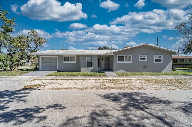 2260 Charleston St, Hollywood, FL 33020 - ranch-style house featuring a garage