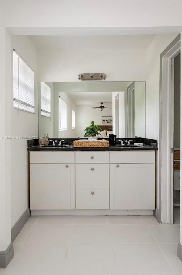 2260 Charleston St, Hollywood, FL 33020 - bathroom with vanity, tile patterned floors, and ceiling fan
