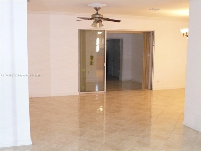 unfurnished room featuring crown molding and ceiling fan