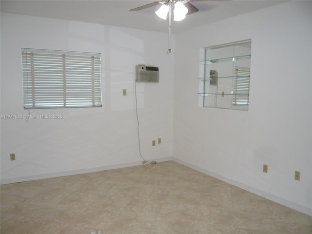 unfurnished room with ceiling fan