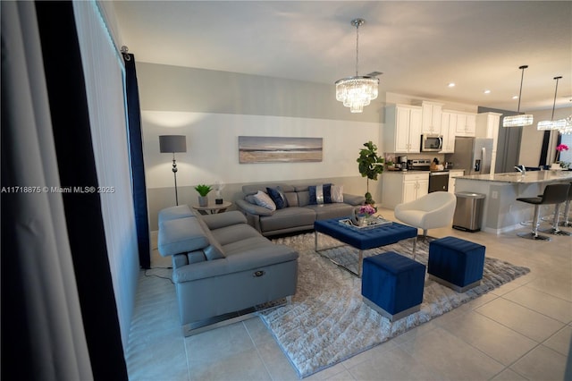 living room with light tile patterned floors, recessed lighting, and a chandelier