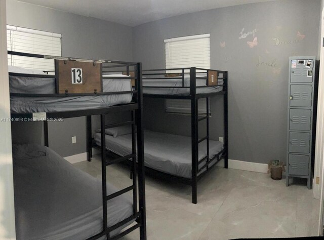 5895 NW 12th Ave, Miami, FL 33127 - bedroom with concrete floors