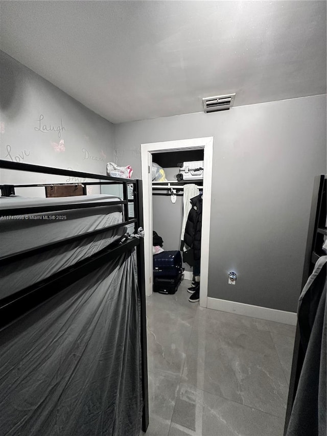 5895 NW 12th Ave, Miami, FL 33127 - unfurnished bedroom with a spacious closet and a closet