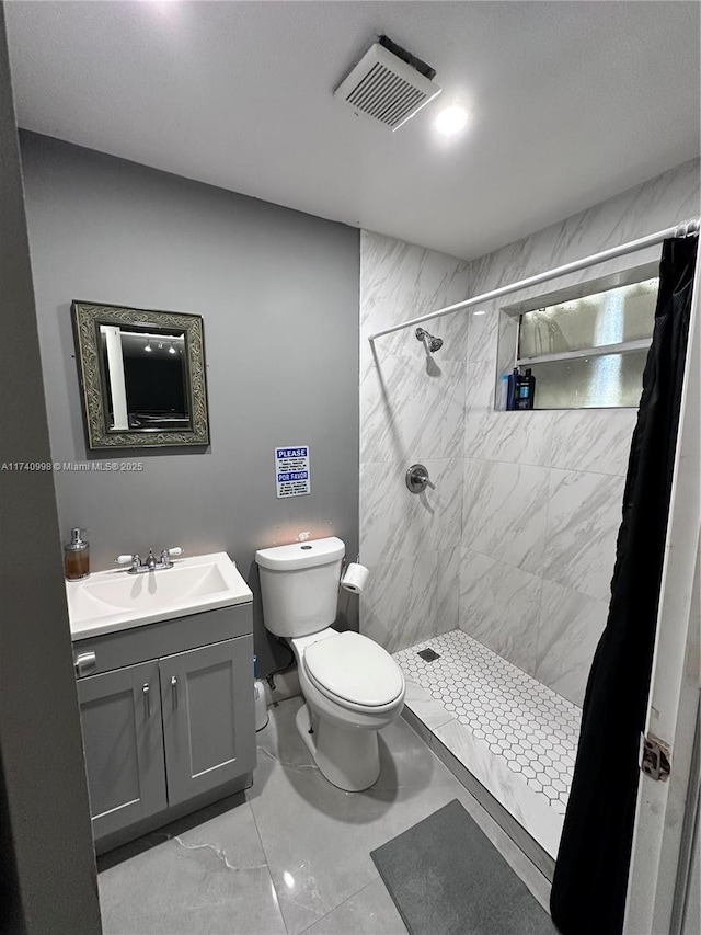 5895 NW 12th Ave, Miami, FL 33127 - bathroom featuring vanity, toilet, and tiled shower