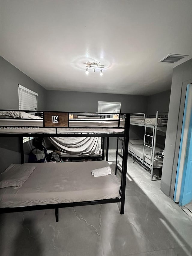 5895 NW 12th Ave, Miami, FL 33127 - bedroom featuring concrete flooring