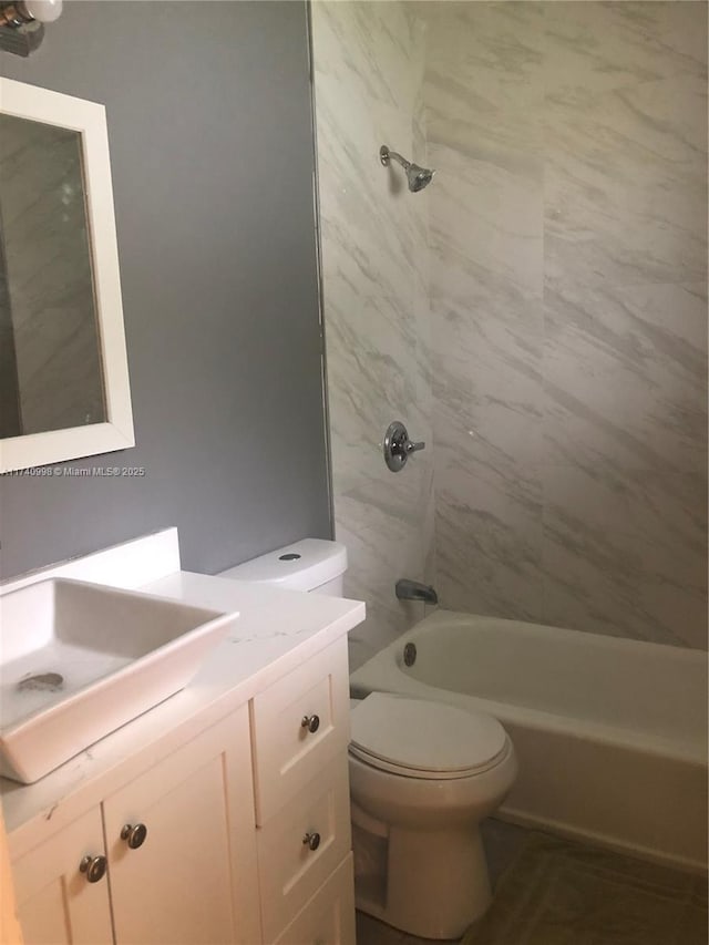 5895 NW 12th Ave, Miami, FL 33127 - full bathroom featuring tiled shower / bath combo, vanity, and toilet