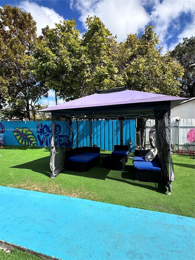 5895 NW 12th Ave, Miami, FL 33127 - exterior space with a gazebo and a yard