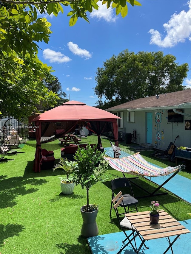 5895 NW 12th Ave, Miami, FL 33127 - view of community featuring a gazebo and a lawn