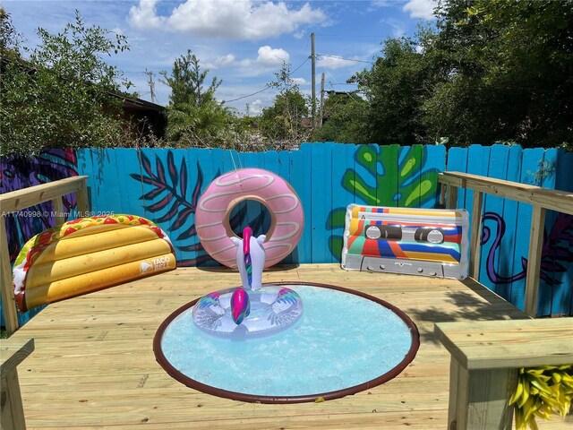 5895 NW 12th Ave, Miami, FL 33127 - view of wooden deck