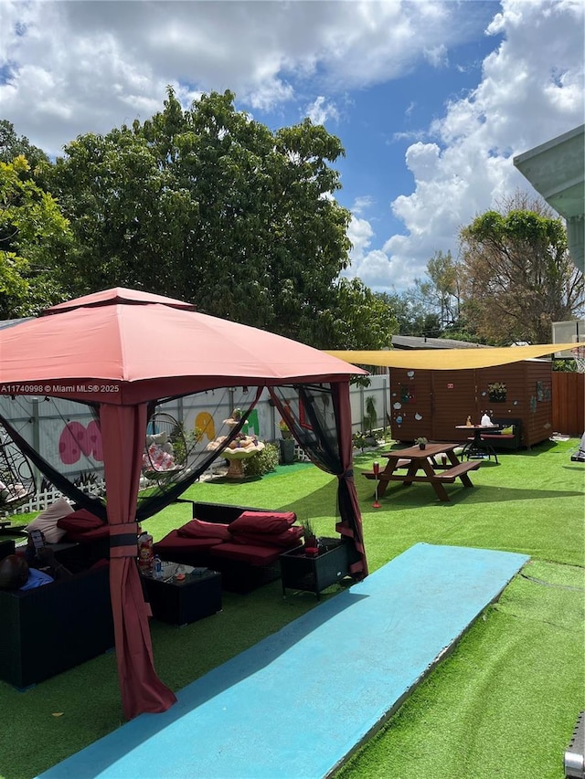 5895 NW 12th Ave, Miami, FL 33127 - view of home's community featuring a gazebo and a lawn