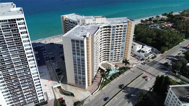 aerial view with a view of the beach and a water view