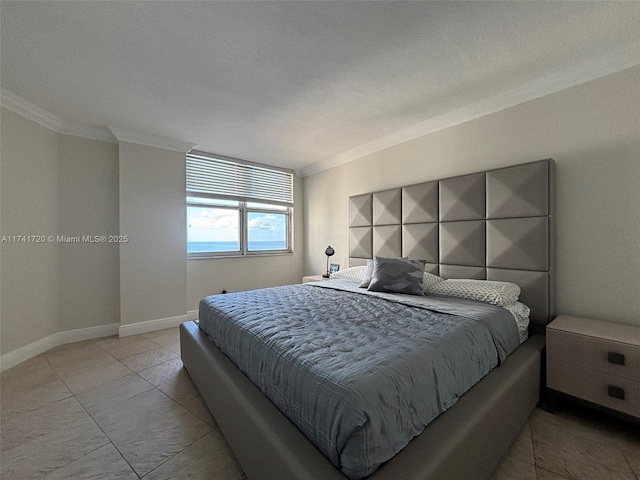 tiled bedroom with ornamental molding