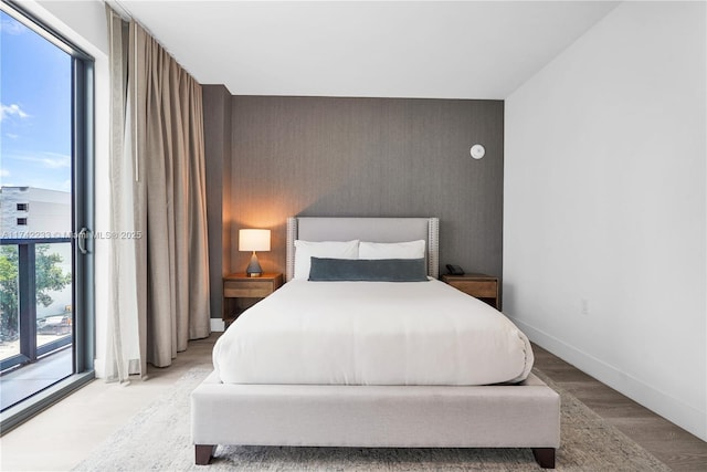 bedroom featuring light wood-type flooring