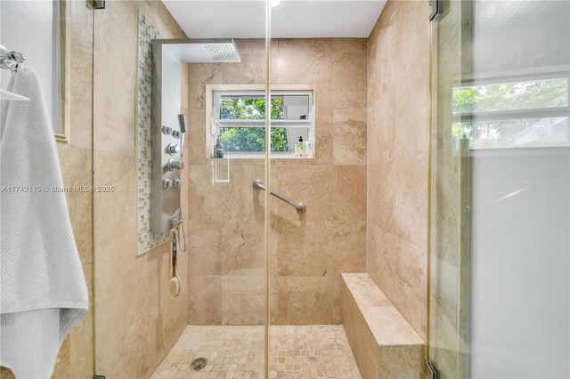 bathroom with an enclosed shower