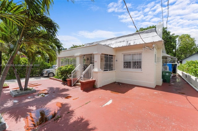 view of front of home featuring a patio