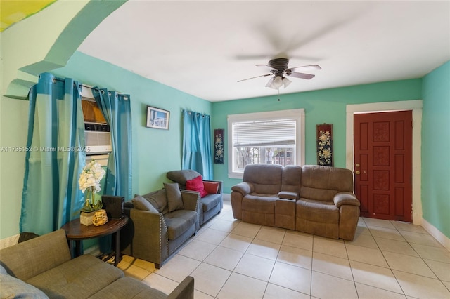 living room with light tile patterned flooring, cooling unit, and ceiling fan