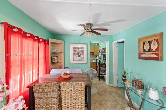 dining room with ceiling fan