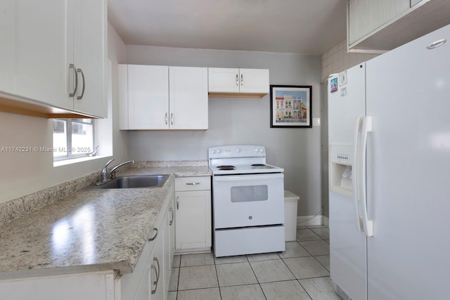 kitchen featuring sink, light stone counters, light tile patterned floors, white appliances, and white cabinets