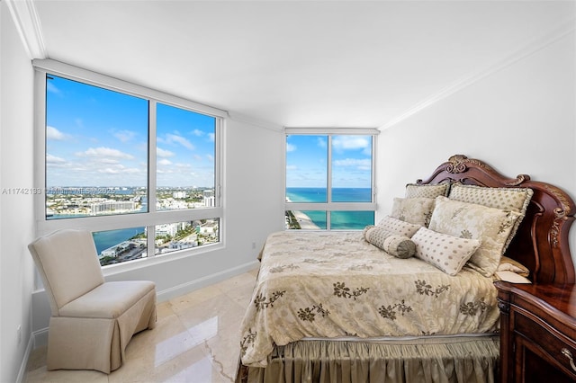 bedroom with a water view and ornamental molding