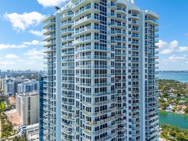 view of building exterior featuring a water view