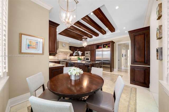 dining space featuring beamed ceiling, ornamental molding, and a notable chandelier