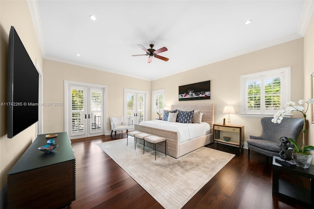 bedroom featuring access to exterior, dark hardwood / wood-style floors, ornamental molding, and french doors