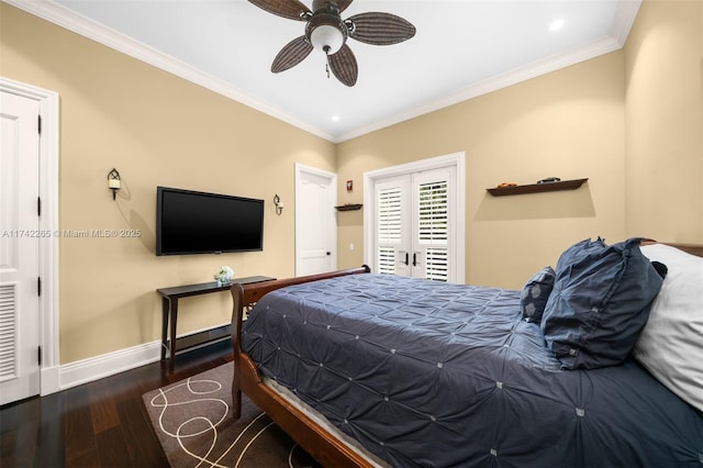 bedroom with crown molding, dark wood-type flooring, ceiling fan, and french doors