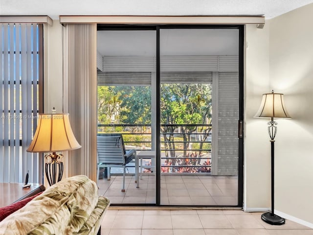 doorway to outside featuring light tile patterned floors