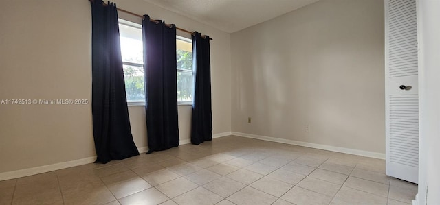 view of tiled empty room