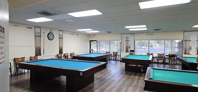 game room with billiards, dark hardwood / wood-style flooring, and a paneled ceiling