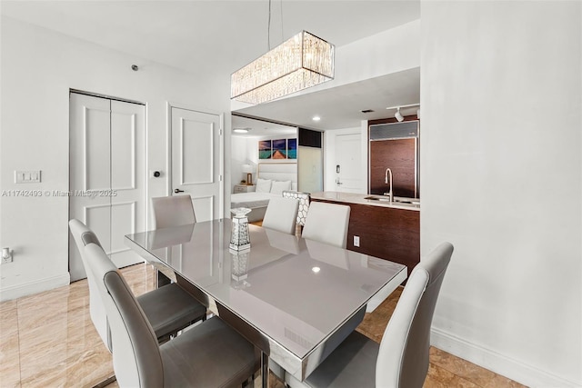 dining room featuring sink