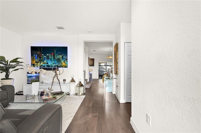 hallway featuring dark wood-type flooring