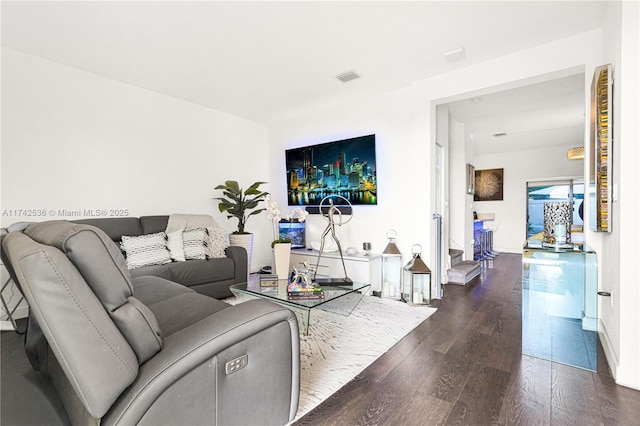 living room with dark wood-type flooring