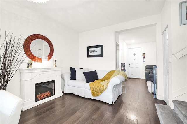 living room with dark wood-type flooring