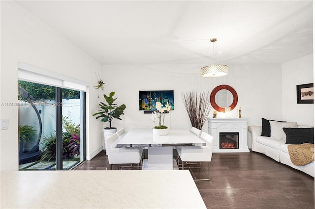 dining area with dark wood-type flooring