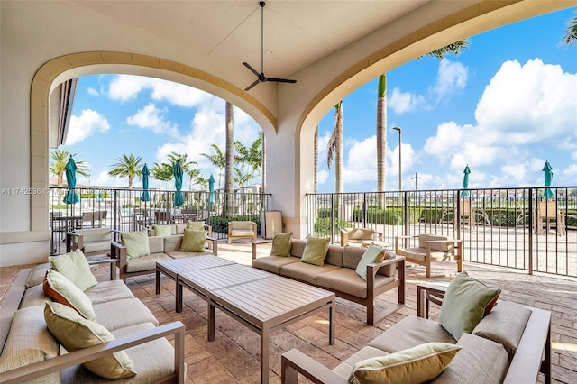 view of patio featuring outdoor lounge area and ceiling fan