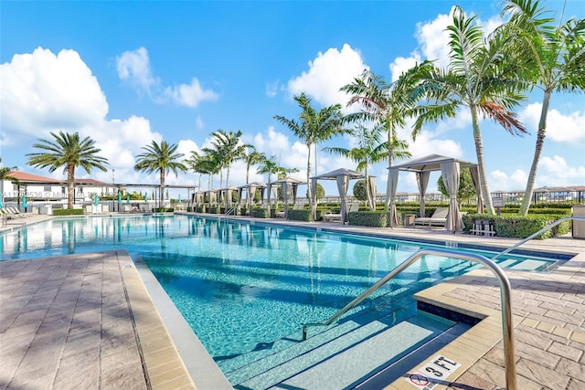 view of swimming pool featuring a patio area