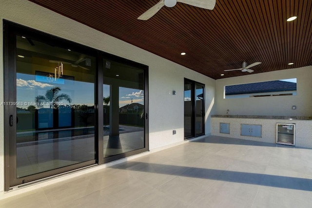 view of patio / terrace with ceiling fan